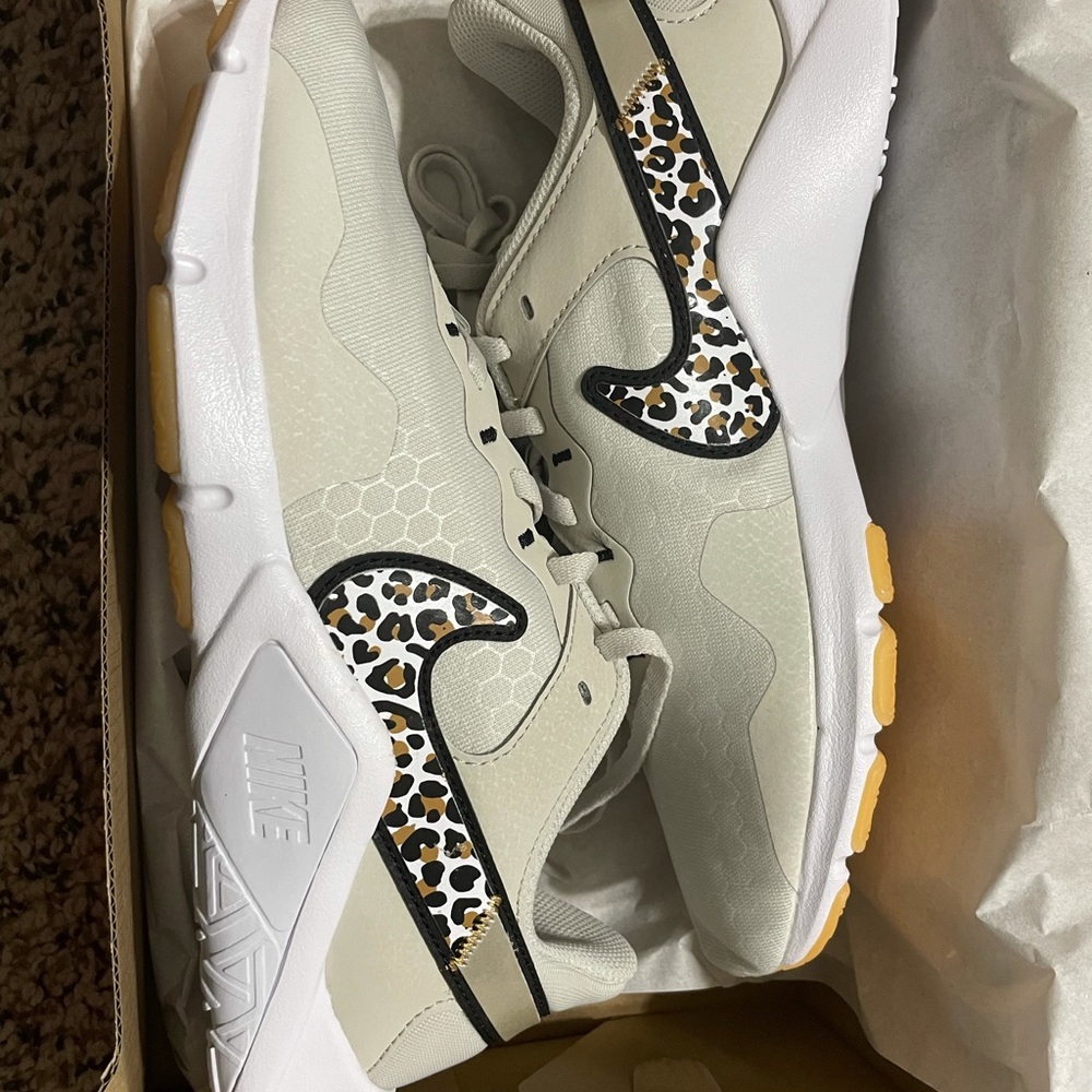 Womens Leopard Nike shoes. Brand new never worn. Size 8.5